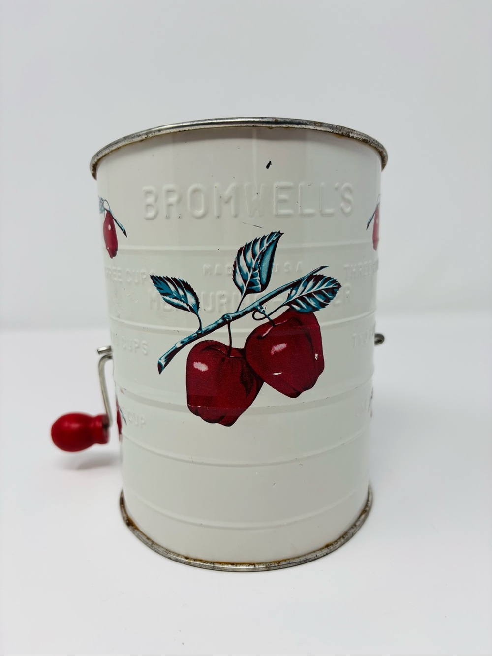 Vintage Cream Hand-Crank Flour Sifter with Red Cherry Motif